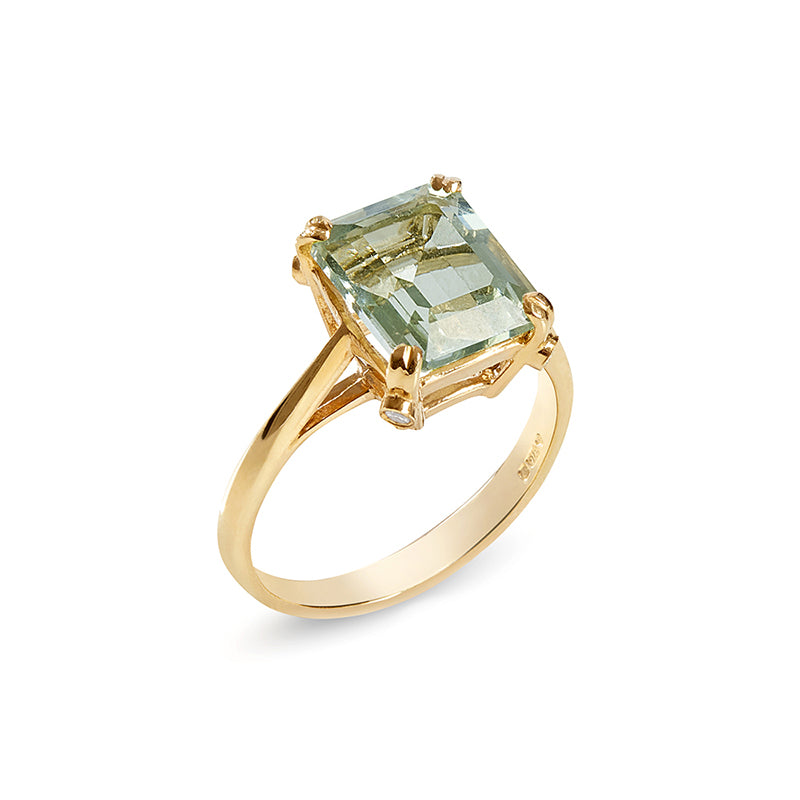 Gold ring with green amethyst solitaire and 4 small diamonds