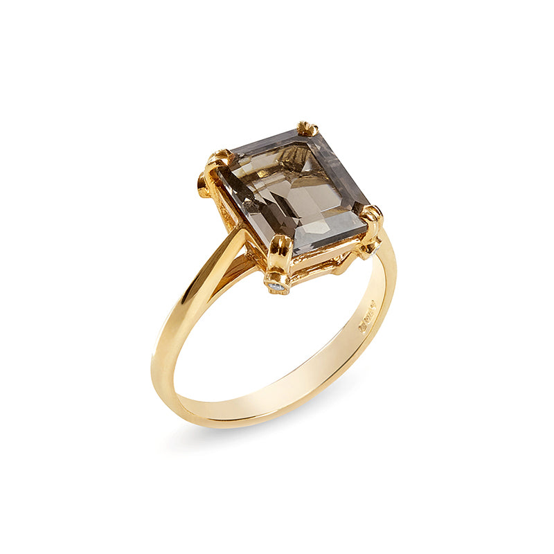 Gold ring with smokey quartz solitaire and 4 small diamonds