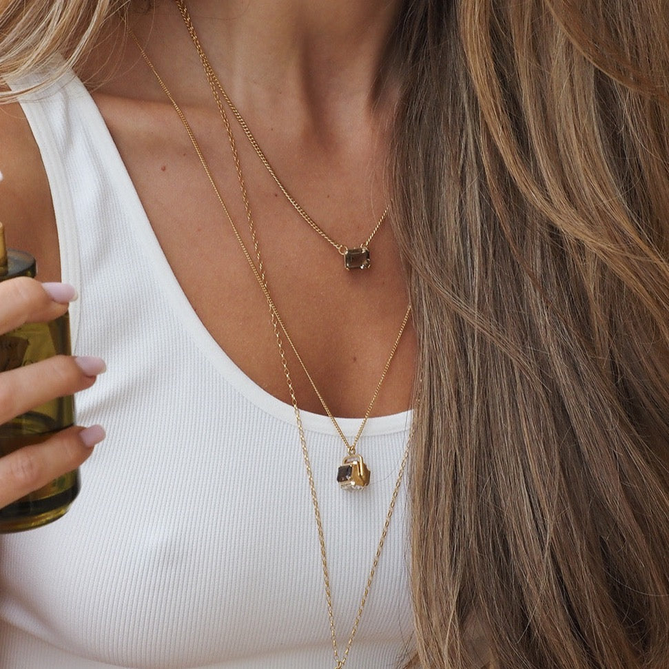 Spinning 4 sided quartz necklace with smokey quartz, clear quartz, citrine and ametrine on gold chain