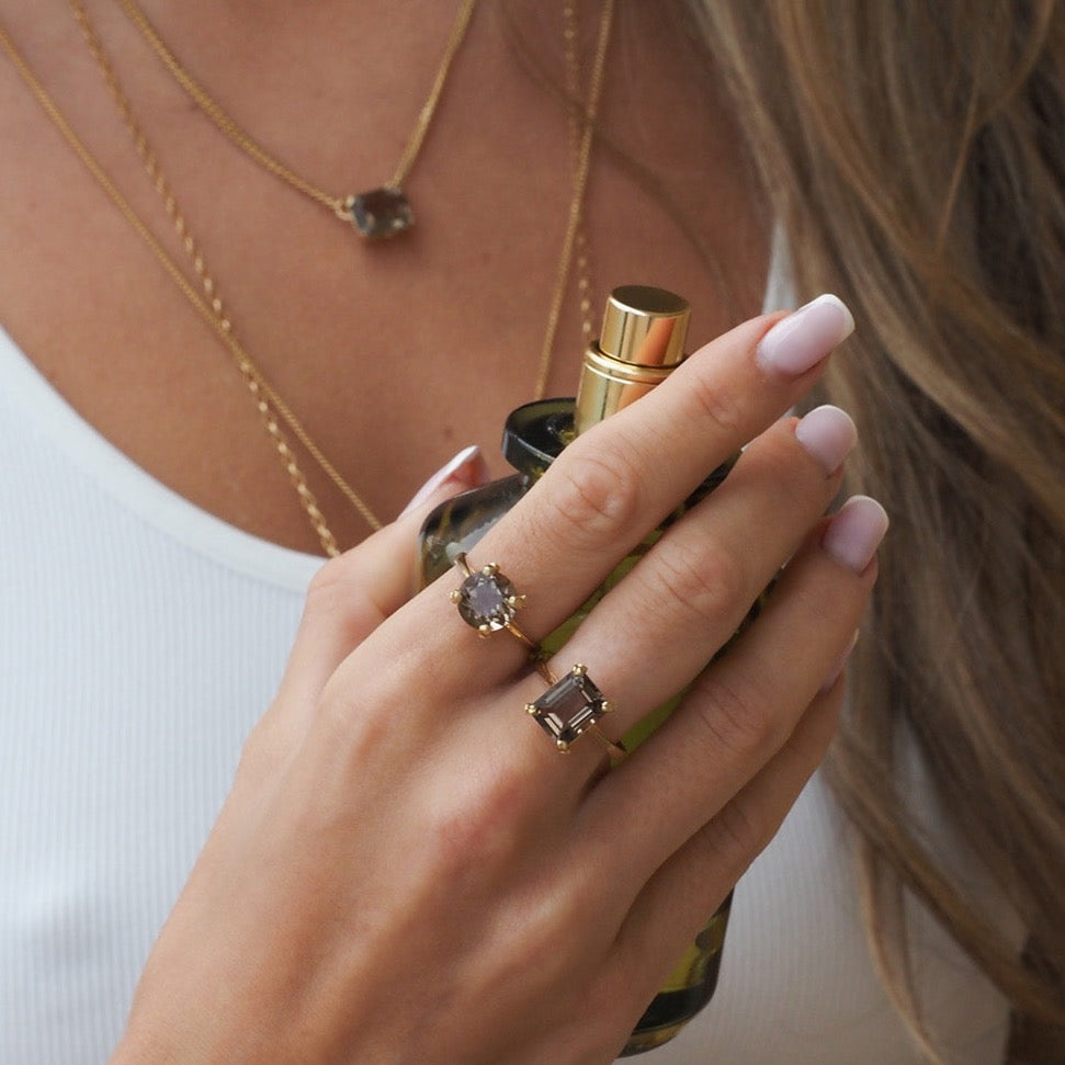 Gold Smokey Quartz round solitaire ring with 4 small diamonds
